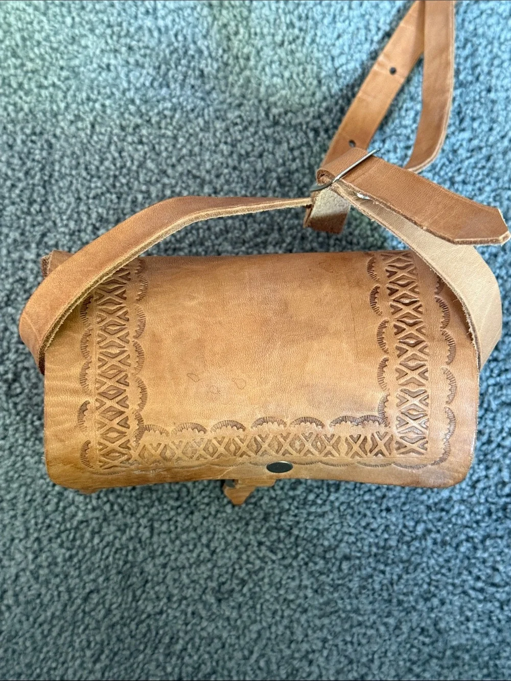 Vintage Tooled Leather Crossbody Bag with Buckle Front.